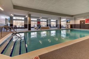 a large swimming pool in a large building at Drury Plaza Hotel Cincinnati Florence in Florence