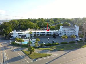 an aerial view of a building with a red star on it at Waterway Condo at Wrightsville! in Wilmington