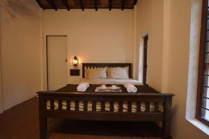 Postel nebo postele na pokoji v ubytování The Cocario