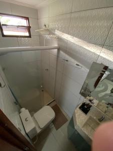 Um banheiro em Triplex Curumim - Zohra