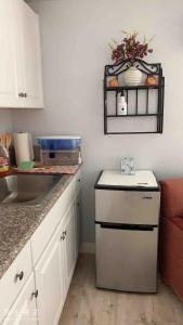 a kitchen with a sink and a counter top at Sun Guest House Pahrump in Pahrump