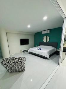 Ένα ή περισσότερα κρεβάτια σε δωμάτιο στο LUXURY CONDO BEACHFRONT AMARA +42 φωτογραφίες