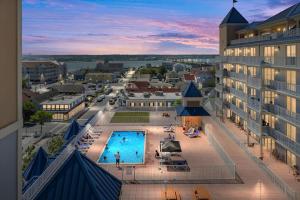 an aerial view of a city with a swimming pool at 3 BR Belmont Towers on Boardwalk: Ocean & Bay Views in Ocean City
