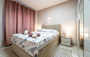 Voodi või voodid majutusasutuse Awesome Apartment In Biograd Na Moru toas +18 fotot