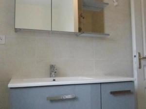 a kitchen with a sink and a cabinet at Spacieuse maison rénovée, nature verdoyante - FR-1-489-176 in Valigny +5 photos