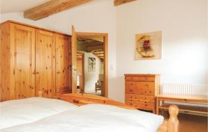Ein Bett oder Betten in einem Zimmer der Unterkunft Ferienhaus - Westendorf