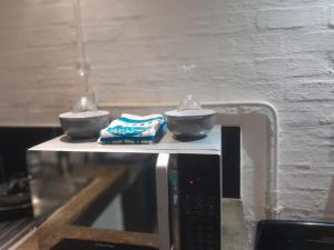 Η κουζίνα ή μικρή κουζίνα στο Hide out Maboneng +10 φωτογραφίες