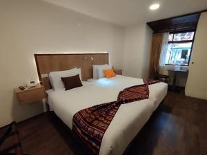 Letto o letti in una camera di Casona Tobar Hotel