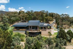an aerial view of a house with a roof at 'Tyalla Lodge' Unique Luxe Design in the Mountains in Mudgee