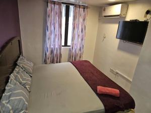 Postel nebo postele na pokoji v ubytování HOTEL Rampai Rooms