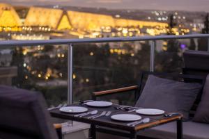 Setusvæði á Saray Pyramids & Museum View Hotel