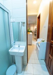 Ein Badezimmer in der Unterkunft THEATRE OF DREAMS HOMES
