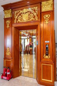 an entrance to a building with a glass door at B2.20 Hoàng Sơn in Vung Tau +65 photos