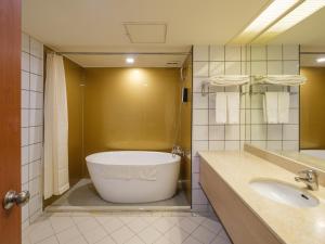 Baðherbergi á Rich & Free Hotel - Fuzhong 富逸旅趣-板橋府中館