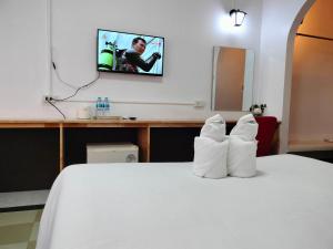 Postel nebo postele na pokoji v ubytování S2S Queen Trang Hotel