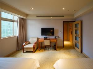 Sjónvarps- og/eða afþreyingartæki á Rich & Free Hotel - Fuzhong 富逸旅趣-板橋府中館