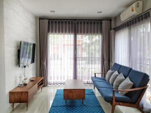 TV a/nebo společenská místnost v ubytování Castello Di Mare