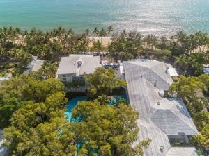 an aerial view of a house and the ocean at Aspen - Beachfront Bliss at The Drift in Palm Cove