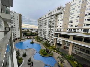 an aerial view of a courtyard in a building at Cozy Apartment 2 bedroom Gateway pasteur Bandung in Bandung
