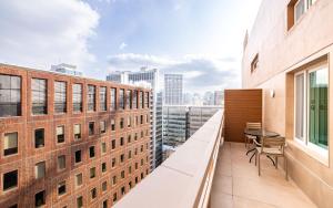 Balkón nebo terasa v ubytování New Seoul Hotel Myeongdong