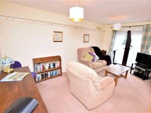 a living room with two chairs and a couch at 1 Bed in Bradwell PK849 in Bradwell