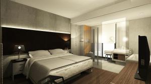 Letto o letti in una camera di The B Hotel Quezon City
