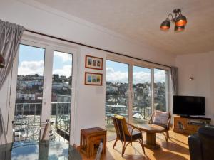 a living room with a view of a city at 2 Bed in Brixham BX026 in Brixham