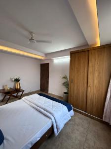 Cama ou camas em um quarto em Saki Homestay-Make Memories