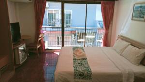Postel nebo postele na pokoji v ubytování the L Hua Hin + 37 fotografií