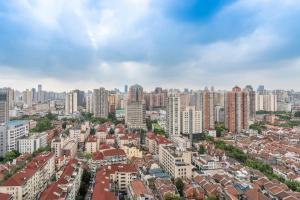 an aerial view of a city with tall buildings at Shanghai Downtown Yidu B&B - Near Jing'an Temple Metro Station in Shanghai