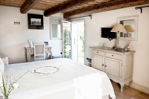 TV a/nebo společenská místnost v ubytování Casina Le Conserve