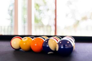 a row of cue balls on a table at 'Bonnie View' A Magnificently Luxurious Retreat in Mudgee