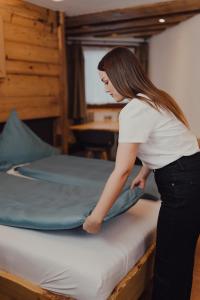 Postel nebo postele na pokoji v ubytování Hotel Forsthof