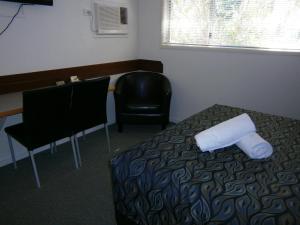 Postel nebo postele na pokoji v ubytování Kellys Motel Oakey