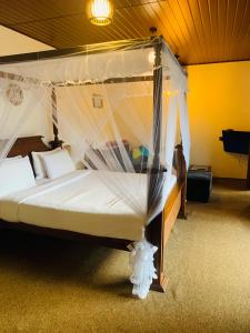 Postel nebo postele na pokoji v ubytování Cozy Homestay