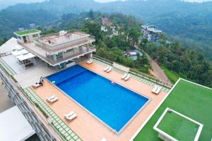 Bazén v ubytování Vibe Munnar Resort & Spa nebo v jeho okolí