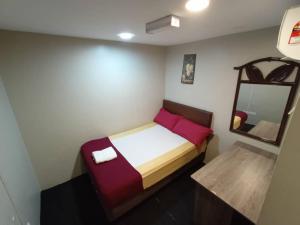 Postel nebo postele na pokoji v ubytování HOTEL Rampai Rooms