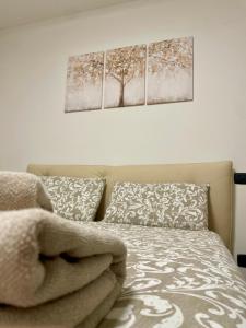 Postel nebo postele na pokoji v ubytování Appartamento piano terra con giardino - Pistoia