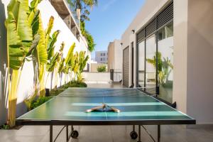 Stolní tenis v ubytování Villa Astoria Eilat nebo okolí