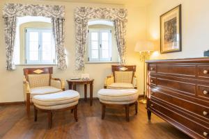 Postel nebo postele na pokoji v ubytování Schloss Frankenberg