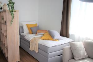 Tempat tidur dalam kamar di Residenz