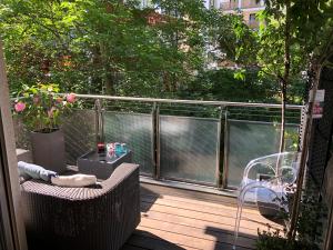 a balcony with a table and chairs on a deck at Best Apartment in the Center of Berlin with Big Terrace in Berlin