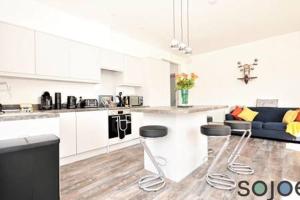 Η κουζίνα ή μικρή κουζίνα στο Stunning split level apartment with roof terrace