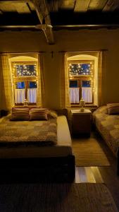 Кровать или кровати в номере Hutai Meseház