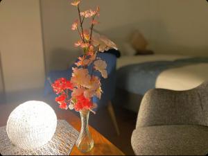 A bed or beds in a room at THE MOON Atami
