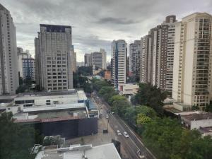 a view of a city with tall buildings at Hotel Av Ibirapuera 2534 Moema São Paulo 3 in São Paulo