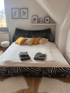 Кровать или кровати в номере App13 - place2b - direkt am Rhein