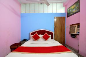 Postel nebo postele na pokoji v ubytování HOTEL JAI MAA PALACE