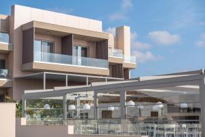 a rendering of a building with a balcony at Oniro Boutique Hotel in Toroni
