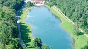 an aerial view of a river with boats in it at Glamping Virton in Virton